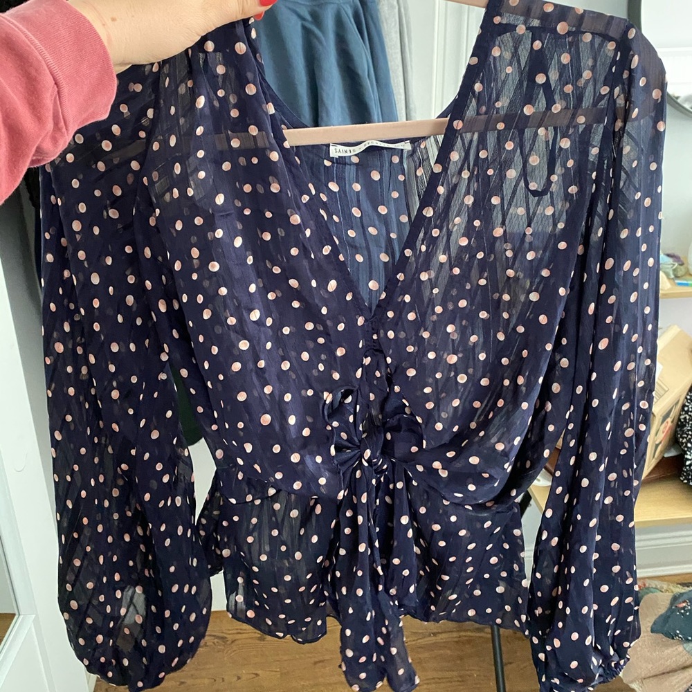 Saints & Secrets polka dot tie-front top